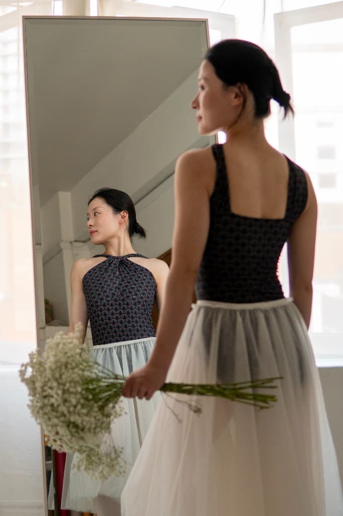 Dancer in blue leotard